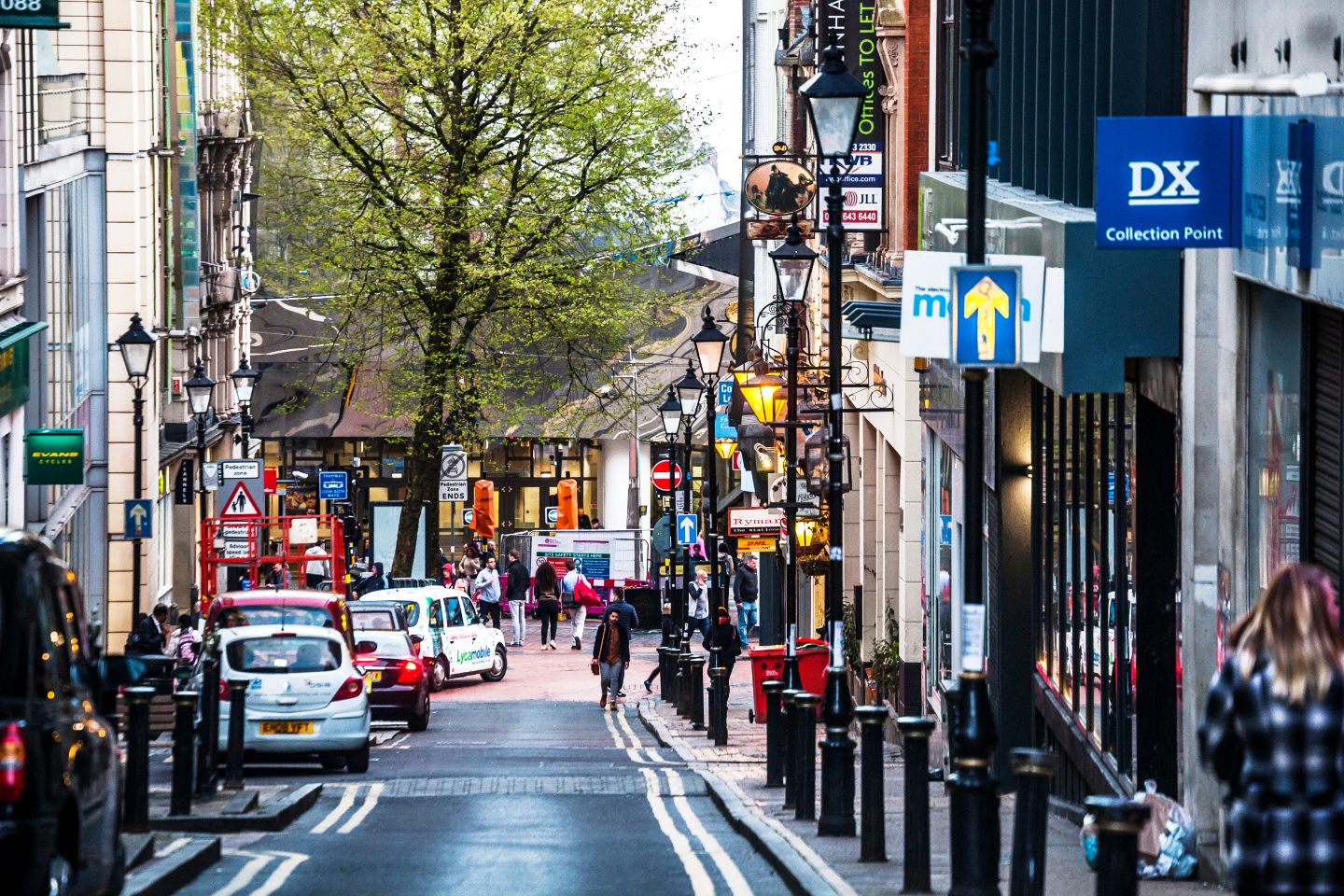 Busy city street with trees