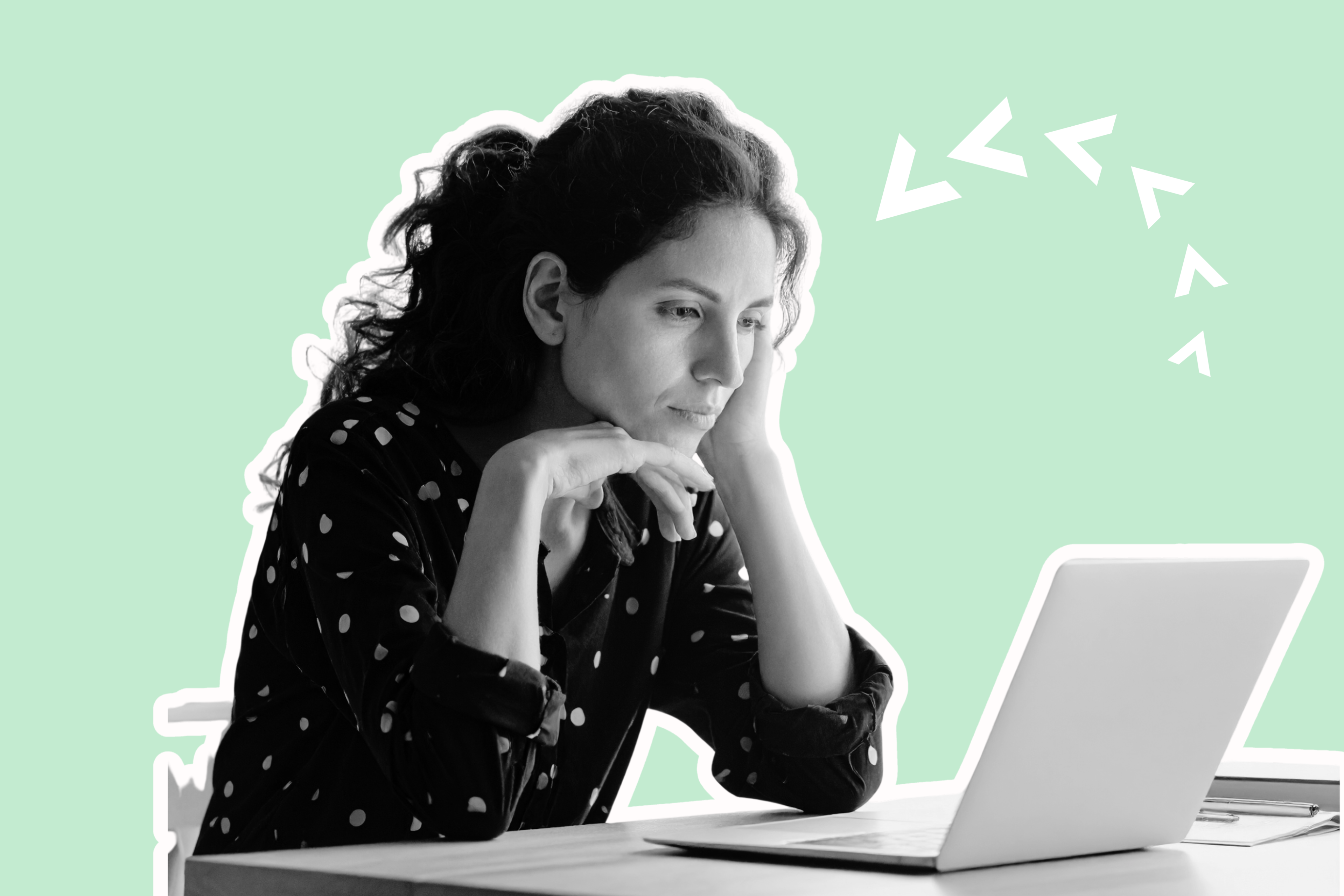 Thoughtful woman on laptop